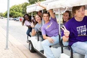 Students who work with the Admissions Office give tours to prospective students and their families. 